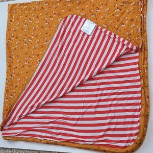Posh Peanut Reversible Floral/Stripe Bamboo  Blanket in Orange and White